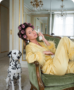 Woman in chair with dalmatian